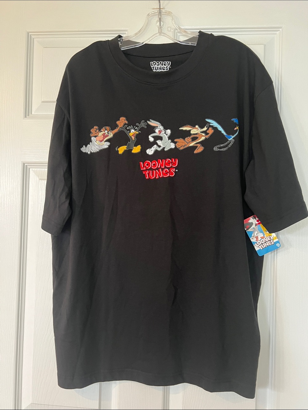Warner Bros. Black Tee with Colorful Looney Tunes Tag